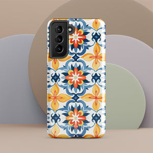 The Mediterranean Bloom for Samsung by Statement Cases features intricate, colorful floral patterns in blue, orange, and yellow. The design covers the entire back of the case, surrounding the camera cutout. Shock-absorbing and impact-resistant, it ensures protection while the brand "Statement Cases" is subtly printed near the bottom.