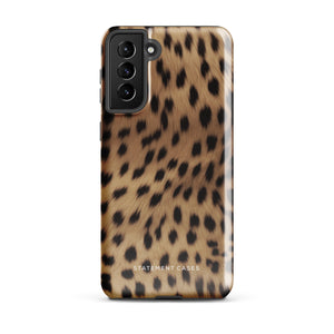 A smartphone with a leopard print, dual-layer design phone case featuring four camera lenses on the back is displayed against a white background. The bottom of the tough phone case has the brand name "Statement Cases" in white letters. The product name is "Daring Cheetah Fur for Samsung".