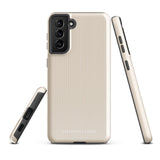 A beige smartphone case with vertical stripes designed for a phone with a triple camera setup. This impact-resistant phone case features precise cutouts for the cameras, buttons, and other essential functions. "Statement Cases" is printed at the bottom of the tough phone case. Product Name: Noble Pinstripe for Samsung