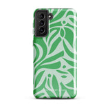 The Selva Verde for Samsung, a product by Statement Cases, is a durable, dual-layer phone case adorned with a green and white leafy design. The back of the case includes a camera cutout, and the bottom is printed with "Statement Cases.