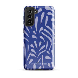 The Mariposa Azul for Samsung smartphone case from Statement Cases is adorned with an impact-resistant design featuring light purple abstract shapes on a blue background. This dual-layer case proudly displays the text "STATEMENT CASES" at the bottom, ensuring that the camera lenses and buttons of your phone remain clearly visible.