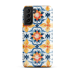 The Mediterranean Bloom for Samsung by Statement Cases features intricate, colorful floral patterns in blue, orange, and yellow. The design covers the entire back of the case, surrounding the camera cutout. Shock-absorbing and impact-resistant, it ensures protection while the brand "Statement Cases" is subtly printed near the bottom.