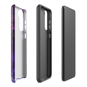 The Golden Orchid Marble for Samsung by Statement Cases is a smartphone adorned with a vibrant, abstract phone case showcasing a mix of purple, pink, and gold colors. Crafted from impact-resistant materials, it features a camera module with four lenses and a flash. At the bottom of the shock-absorbing phone case, you’ll find the text "STATEMENT CASES" in white.