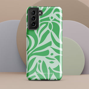 The Selva Verde for Samsung, a product by Statement Cases, is a durable, dual-layer phone case adorned with a green and white leafy design. The back of the case includes a camera cutout, and the bottom is printed with "Statement Cases.