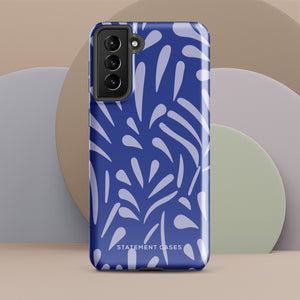 The Mariposa Azul for Samsung smartphone case from Statement Cases is adorned with an impact-resistant design featuring light purple abstract shapes on a blue background. This dual-layer case proudly displays the text "STATEMENT CASES" at the bottom, ensuring that the camera lenses and buttons of your phone remain clearly visible.