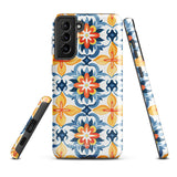 The Mediterranean Bloom for Samsung by Statement Cases features intricate, colorful floral patterns in blue, orange, and yellow. The design covers the entire back of the case, surrounding the camera cutout. Shock-absorbing and impact-resistant, it ensures protection while the brand "Statement Cases" is subtly printed near the bottom.