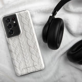 A stylish, impact-resistant phone case with a textured white braided design, covering the back of a smartphone. The dual-layer design features cutouts for the camera and buttons, and "Cozy Knit Bliss for Samsung" by Statement Cases is embossed at the bottom.