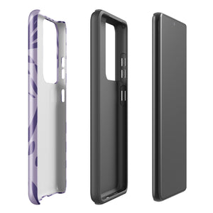 Introducing the Luna Morada for Samsung, a striking smartphone case from Statement Cases. This decorative purple cover boasts abstract floral and organic patterns in darker hues and is designed to absorb shocks. The impact-resistant case features a camera cutout that accommodates five lenses, with the brand name "STATEMENT CASES" elegantly printed at the bottom center.