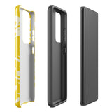 The Sol Dorado for Samsung by Statement Cases is a durable phone case featuring a bright yellow background adorned with an abstract white floral pattern, showcasing various flowers and leaves. Near the bottom edge, the text "STATEMENT CASE" highlights its dual-layer design for enhanced durability.