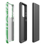 The Selva Verde for Samsung, a product by Statement Cases, is a durable, dual-layer phone case adorned with a green and white leafy design. The back of the case includes a camera cutout, and the bottom is printed with "Statement Cases.