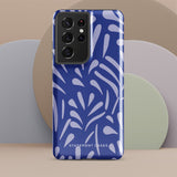 The Mariposa Azul for Samsung smartphone case from Statement Cases is adorned with an impact-resistant design featuring light purple abstract shapes on a blue background. This dual-layer case proudly displays the text "STATEMENT CASES" at the bottom, ensuring that the camera lenses and buttons of your phone remain clearly visible.