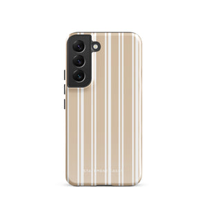 A smartphone with a beige and white striped, shock-absorbing phone case. The case has cutouts for the camera lenses and buttons on the left side. The lower part of the case features a small logo that reads "Statement Cases" — this is the Estate Stripe for Samsung by Statement Cases.