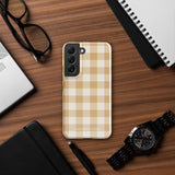 A beige and white checkered phone case is shown. Designed to fit a smartphone with a horizontal dual-camera setup, it features "STATEMENT CASES" printed at the bottom. This impact-resistant phone case offers both style and protection.Product Name: Gingham Grace for Samsung Brand Name: Statement Cases