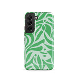 The Selva Verde for Samsung, a product by Statement Cases, is a durable, dual-layer phone case adorned with a green and white leafy design. The back of the case includes a camera cutout, and the bottom is printed with "Statement Cases.