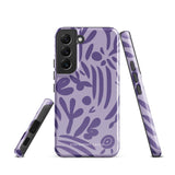 Introducing the Luna Morada for Samsung, a striking smartphone case from Statement Cases. This decorative purple cover boasts abstract floral and organic patterns in darker hues and is designed to absorb shocks. The impact-resistant case features a camera cutout that accommodates five lenses, with the brand name "STATEMENT CASES" elegantly printed at the bottom center.