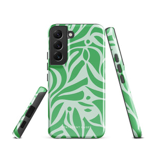 The Selva Verde for Samsung, a product by Statement Cases, is a durable, dual-layer phone case adorned with a green and white leafy design. The back of the case includes a camera cutout, and the bottom is printed with "Statement Cases.