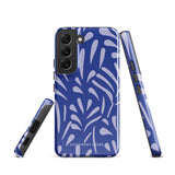 The Mariposa Azul for Samsung smartphone case from Statement Cases is adorned with an impact-resistant design featuring light purple abstract shapes on a blue background. This dual-layer case proudly displays the text "STATEMENT CASES" at the bottom, ensuring that the camera lenses and buttons of your phone remain clearly visible.