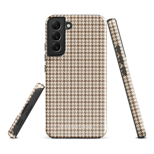 A Samsung smartphone with a beige and brown houndstooth patterned, impact-resistant case from Statement Cases. The phone features multiple cameras on the upper left side of its back. This tough Classic Houndstooth for Samsung phone case has a sleek, dual-layer design with precise cutouts for the cameras and buttons.