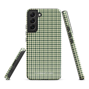 A smartphone with a green and white houndstooth patterned impact-resistant case is shown. The phone's camera module with multiple lenses is visible on the top left corner of the Elegance Houndstooth for Samsung shock-absorbing case by Statement Cases.