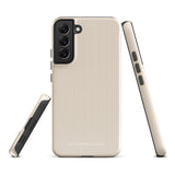 A beige smartphone case with vertical stripes designed for a phone with a triple camera setup. This impact-resistant phone case features precise cutouts for the cameras, buttons, and other essential functions. "Statement Cases" is printed at the bottom of the tough phone case. Product Name: Noble Pinstripe for Samsung