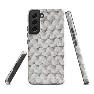 A Chunky Comfort for Samsung with a realistic knitted texture featuring white interwoven yarns. The impact-resistant case has multiple camera cutouts and a shock-absorbing dual-layer design. The brand name "Statement Cases" is printed at the bottom.