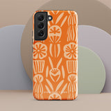 This stylish smartphone accessory, the Savannah Ardiente for Samsung by Statement Cases, features a shock-absorbing, colorful patterned case adorned with abstract flower designs in beige on an orange background. This impact-resistant phone case wraps around the back of your device, providing robust protection for its multiple camera lenses in the corner.