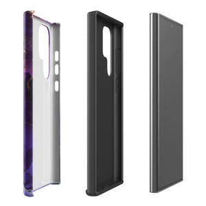 The Golden Orchid Marble for Samsung by Statement Cases is a smartphone adorned with a vibrant, abstract phone case showcasing a mix of purple, pink, and gold colors. Crafted from impact-resistant materials, it features a camera module with four lenses and a flash. At the bottom of the shock-absorbing phone case, you’ll find the text "STATEMENT CASES" in white.