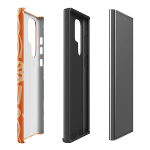 This stylish smartphone accessory, the Savannah Ardiente for Samsung by Statement Cases, features a shock-absorbing, colorful patterned case adorned with abstract flower designs in beige on an orange background. This impact-resistant phone case wraps around the back of your device, providing robust protection for its multiple camera lenses in the corner.