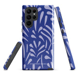 The Mariposa Azul for Samsung smartphone case from Statement Cases is adorned with an impact-resistant design featuring light purple abstract shapes on a blue background. This dual-layer case proudly displays the text "STATEMENT CASES" at the bottom, ensuring that the camera lenses and buttons of your phone remain clearly visible.