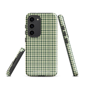 A smartphone with a green and white houndstooth patterned impact-resistant case is shown. The phone's camera module with multiple lenses is visible on the top left corner of the Elegance Houndstooth for Samsung shock-absorbing case by Statement Cases.