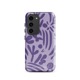 Introducing the Luna Morada for Samsung, a striking smartphone case from Statement Cases. This decorative purple cover boasts abstract floral and organic patterns in darker hues and is designed to absorb shocks. The impact-resistant case features a camera cutout that accommodates five lenses, with the brand name "STATEMENT CASES" elegantly printed at the bottom center.