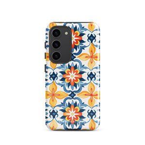 The Mediterranean Bloom for Samsung by Statement Cases features intricate, colorful floral patterns in blue, orange, and yellow. The design covers the entire back of the case, surrounding the camera cutout. Shock-absorbing and impact-resistant, it ensures protection while the brand "Statement Cases" is subtly printed near the bottom.