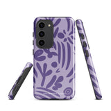 Introducing the Luna Morada for Samsung, a striking smartphone case from Statement Cases. This decorative purple cover boasts abstract floral and organic patterns in darker hues and is designed to absorb shocks. The impact-resistant case features a camera cutout that accommodates five lenses, with the brand name "STATEMENT CASES" elegantly printed at the bottom center.