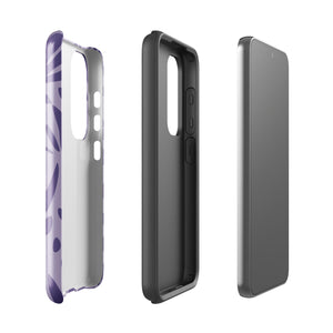 Introducing the Luna Morada for Samsung, a striking smartphone case from Statement Cases. This decorative purple cover boasts abstract floral and organic patterns in darker hues and is designed to absorb shocks. The impact-resistant case features a camera cutout that accommodates five lenses, with the brand name "STATEMENT CASES" elegantly printed at the bottom center.