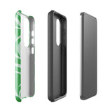 The Selva Verde for Samsung, a product by Statement Cases, is a durable, dual-layer phone case adorned with a green and white leafy design. The back of the case includes a camera cutout, and the bottom is printed with "Statement Cases.