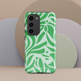 The Selva Verde for Samsung, a product by Statement Cases, is a durable, dual-layer phone case adorned with a green and white leafy design. The back of the case includes a camera cutout, and the bottom is printed with "Statement Cases.