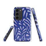 The Mariposa Azul for Samsung smartphone case from Statement Cases is adorned with an impact-resistant design featuring light purple abstract shapes on a blue background. This dual-layer case proudly displays the text "STATEMENT CASES" at the bottom, ensuring that the camera lenses and buttons of your phone remain clearly visible.