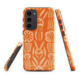 This stylish smartphone accessory, the Savannah Ardiente for Samsung by Statement Cases, features a shock-absorbing, colorful patterned case adorned with abstract flower designs in beige on an orange background. This impact-resistant phone case wraps around the back of your device, providing robust protection for its multiple camera lenses in the corner.