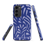 The Mariposa Azul for Samsung smartphone case from Statement Cases is adorned with an impact-resistant design featuring light purple abstract shapes on a blue background. This dual-layer case proudly displays the text "STATEMENT CASES" at the bottom, ensuring that the camera lenses and buttons of your phone remain clearly visible.