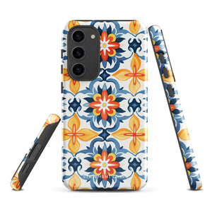 The Mediterranean Bloom for Samsung by Statement Cases features intricate, colorful floral patterns in blue, orange, and yellow. The design covers the entire back of the case, surrounding the camera cutout. Shock-absorbing and impact-resistant, it ensures protection while the brand "Statement Cases" is subtly printed near the bottom.