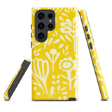 The Sol Dorado for Samsung by Statement Cases is a durable phone case featuring a bright yellow background adorned with an abstract white floral pattern, showcasing various flowers and leaves. Near the bottom edge, the text "STATEMENT CASE" highlights its dual-layer design for enhanced durability.