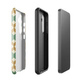 A smartphone with a dual-layer design case featuring a mix of green, beige, and tan shapes. The Old World Mosaic for Samsung has a "Statement Cases" logo at the bottom and is impact-resistant, ensuring your phone with its quad-camera setup stays protected.