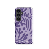 Introducing the Luna Morada for Samsung, a striking smartphone case from Statement Cases. This decorative purple cover boasts abstract floral and organic patterns in darker hues and is designed to absorb shocks. The impact-resistant case features a camera cutout that accommodates five lenses, with the brand name "STATEMENT CASES" elegantly printed at the bottom center.