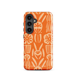 This stylish smartphone accessory, the Savannah Ardiente for Samsung by Statement Cases, features a shock-absorbing, colorful patterned case adorned with abstract flower designs in beige on an orange background. This impact-resistant phone case wraps around the back of your device, providing robust protection for its multiple camera lenses in the corner.