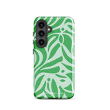 The Selva Verde for Samsung, a product by Statement Cases, is a durable, dual-layer phone case adorned with a green and white leafy design. The back of the case includes a camera cutout, and the bottom is printed with "Statement Cases.