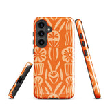 This stylish smartphone accessory, the Savannah Ardiente for Samsung by Statement Cases, features a shock-absorbing, colorful patterned case adorned with abstract flower designs in beige on an orange background. This impact-resistant phone case wraps around the back of your device, providing robust protection for its multiple camera lenses in the corner.