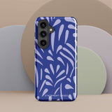 The Mariposa Azul for Samsung smartphone case from Statement Cases is adorned with an impact-resistant design featuring light purple abstract shapes on a blue background. This dual-layer case proudly displays the text "STATEMENT CASES" at the bottom, ensuring that the camera lenses and buttons of your phone remain clearly visible.