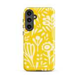 The Sol Dorado for Samsung by Statement Cases is a durable phone case featuring a bright yellow background adorned with an abstract white floral pattern, showcasing various flowers and leaves. Near the bottom edge, the text "STATEMENT CASE" highlights its dual-layer design for enhanced durability.