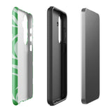 The Selva Verde for Samsung, a product by Statement Cases, is a durable, dual-layer phone case adorned with a green and white leafy design. The back of the case includes a camera cutout, and the bottom is printed with "Statement Cases.