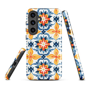 The Mediterranean Bloom for Samsung by Statement Cases features intricate, colorful floral patterns in blue, orange, and yellow. The design covers the entire back of the case, surrounding the camera cutout. Shock-absorbing and impact-resistant, it ensures protection while the brand "Statement Cases" is subtly printed near the bottom.